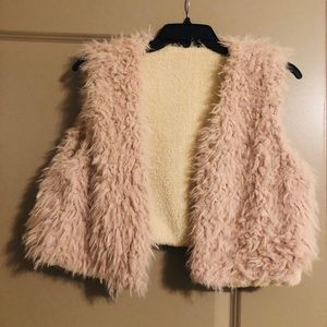 Light pink fuzzy vest
